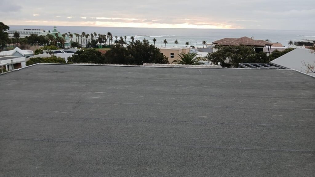 Completed project: Camps Bay flat roof restored with durable torch-on waterproofing.